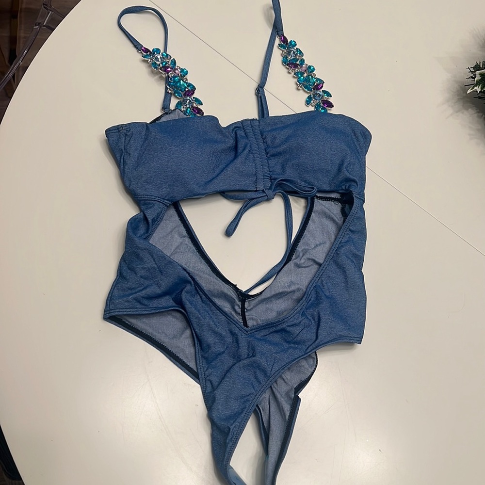 Brand new fashion now denim one piece wdiamond straps and cinched low rise back